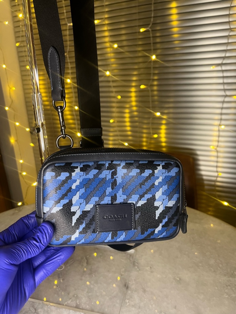 Coach Carrier Phone Crossbody in black and blue